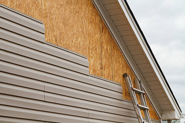 Professional Fiber Cement Siding technician working in Kenly, NC